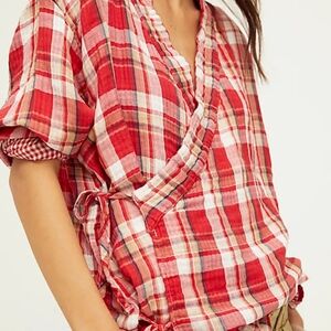 FREE PEOPLE wrap top multiple size fit.  Long sleeve.